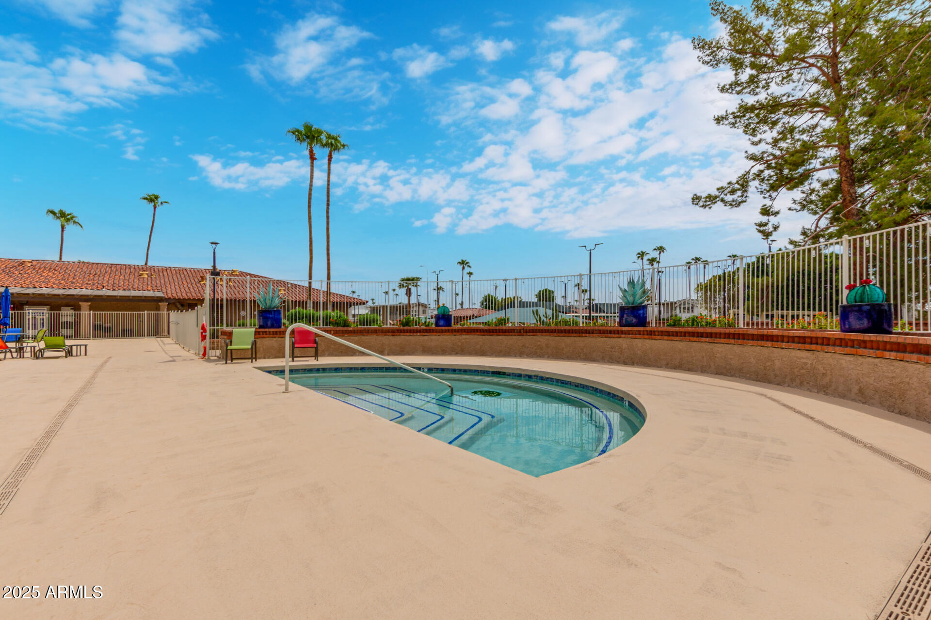 111 South Greenfield Road, Unit 480 Mesa, AZ 85206 - Photo 26 of 29 a view of outdoor space with garden and lots of cars on street