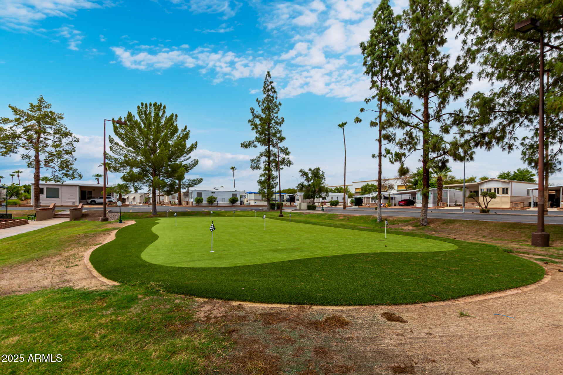 111 South Greenfield Road, Unit 480 Mesa, AZ 85206 - Photo 28 of 29 a view of a park with large trees