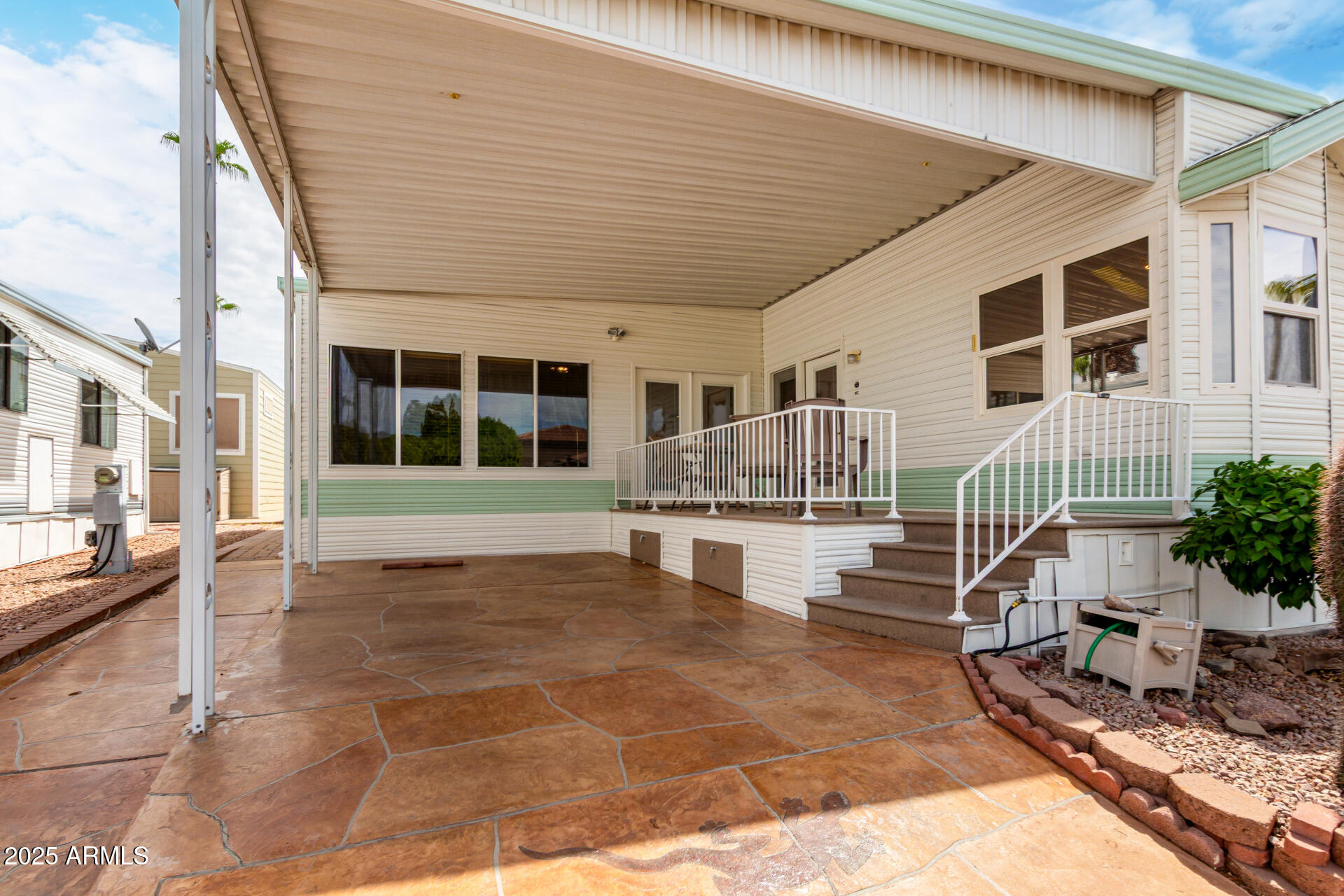 111 South Greenfield Road, Unit 480 Mesa, AZ 85206 - Photo 3 of 29 a view of a swimming pool with a patio