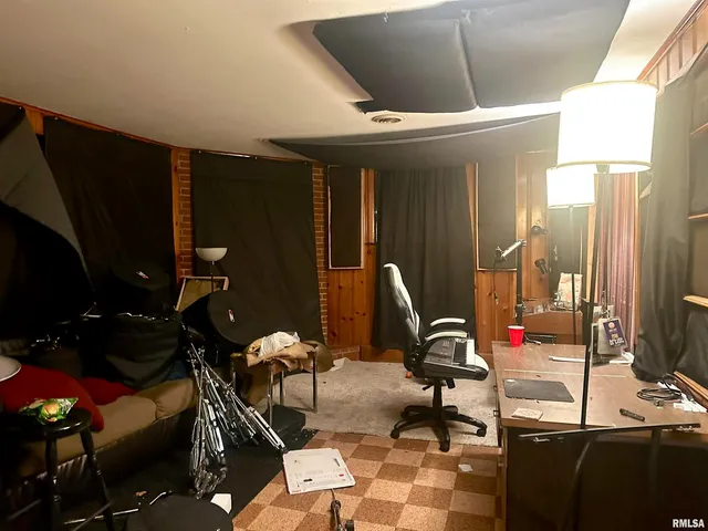 a view of a workspace with furniture