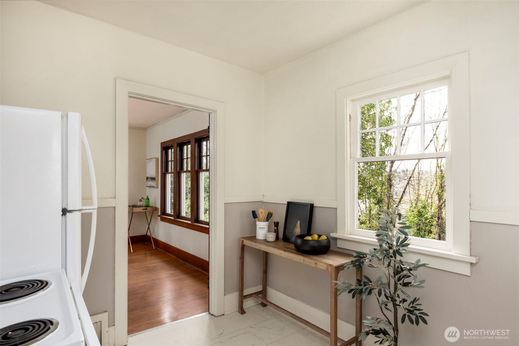 1815 29th Avenue South Seattle, WA 98144 - Photo 12 of 25 a view of a workspace with furniture and a window