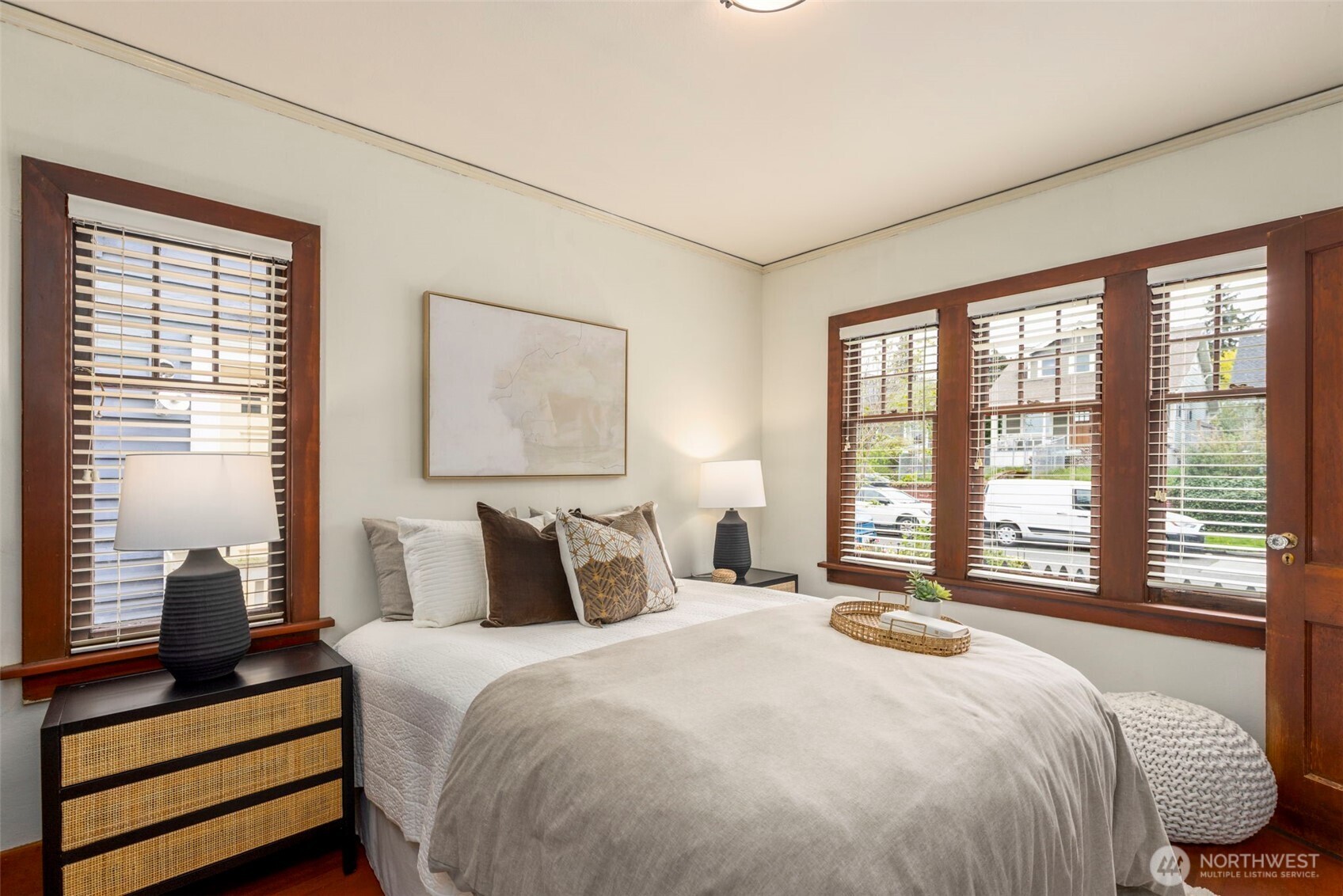 1815 29th Avenue South Seattle, WA 98144 - Photo 14 of 25 a bedroom with a large bed and a large window
