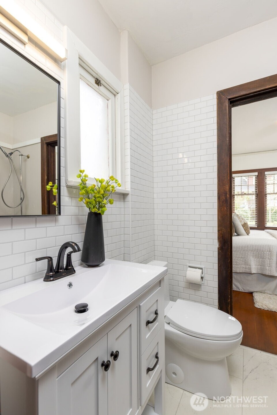 1815 29th Avenue South Seattle, WA 98144 - Photo 16 of 25 a bathroom with a sink toilet and shower