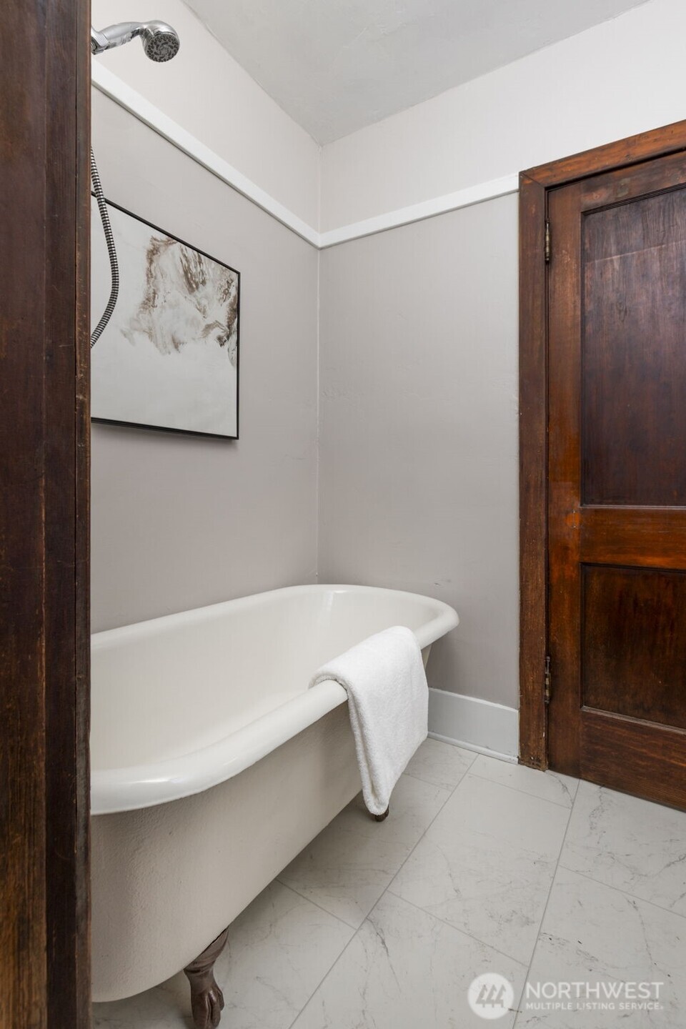 1815 29th Avenue South Seattle, WA 98144 - Photo 17 of 25 a bathroom with a bathtub and shower