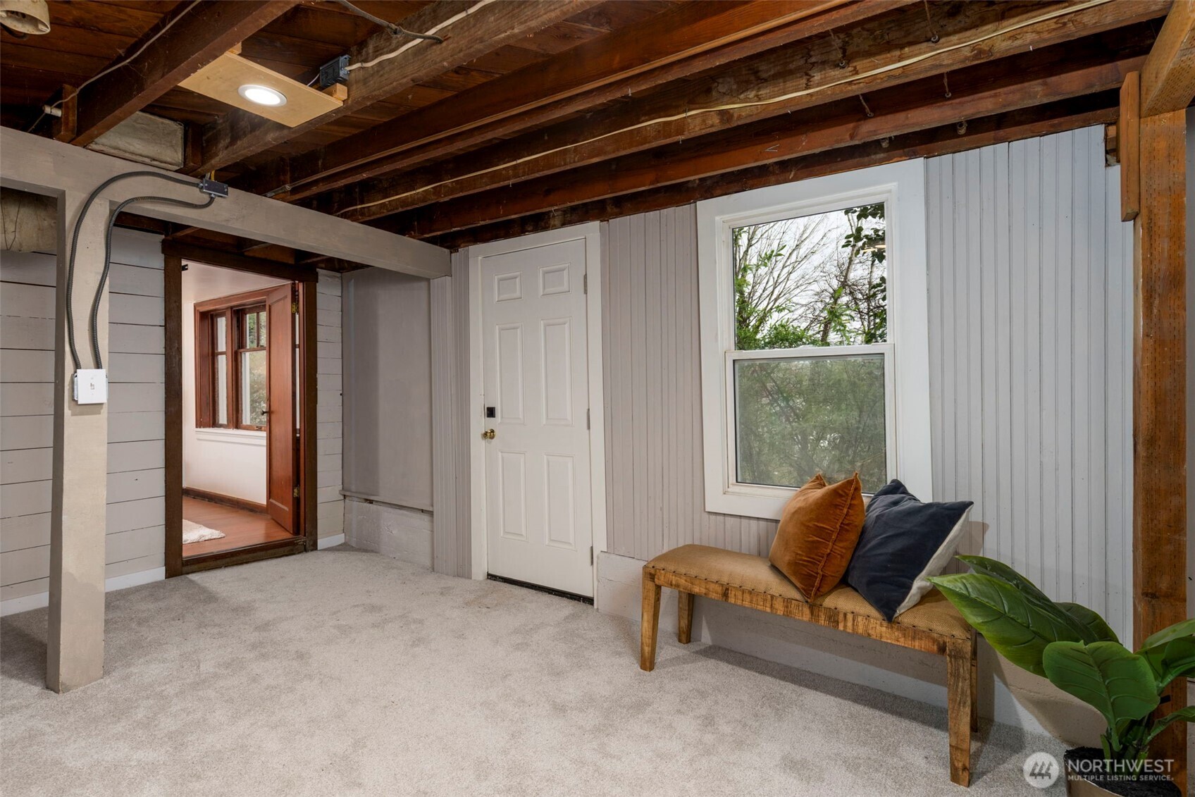 1815 29th Avenue South Seattle, WA 98144 - Photo 21 of 25 a living room with furniture and a window