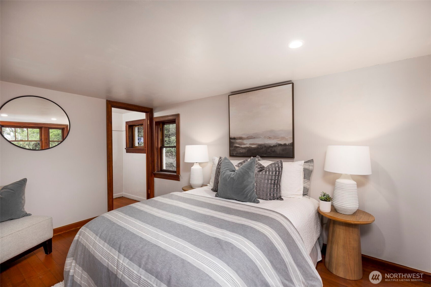 1815 29th Avenue South Seattle, WA 98144 - Photo 22 of 25 a bedroom with a bed and a lamp