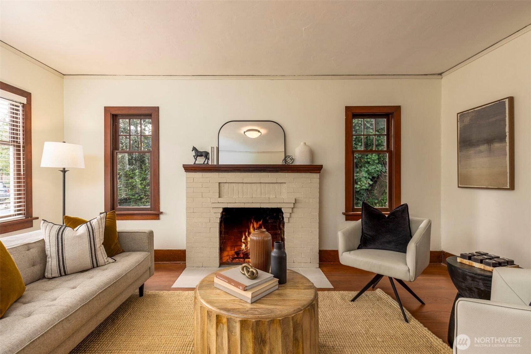 1815 29th Avenue South Seattle, WA 98144 - Photo 4 of 25 a living room with furniture and a fireplace