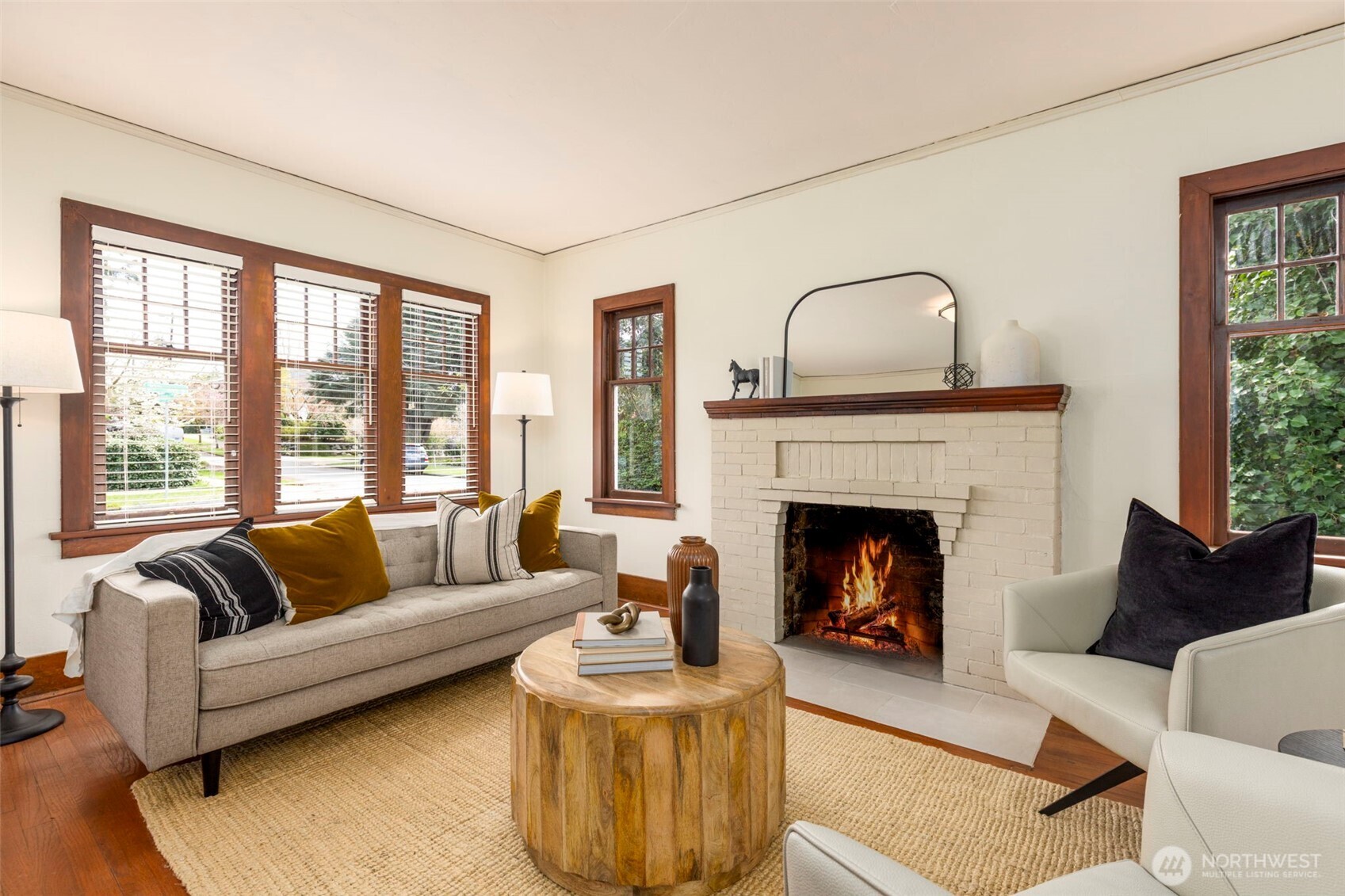 1815 29th Avenue South Seattle, WA 98144 - Photo 5 of 25 a living room with furniture and a fireplace