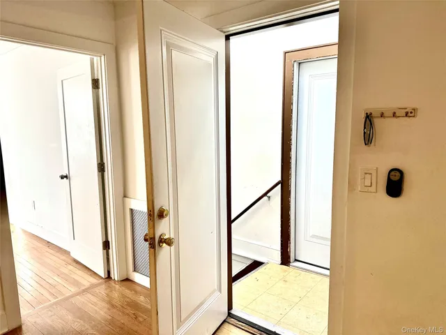 a view of a bathroom with a glass door