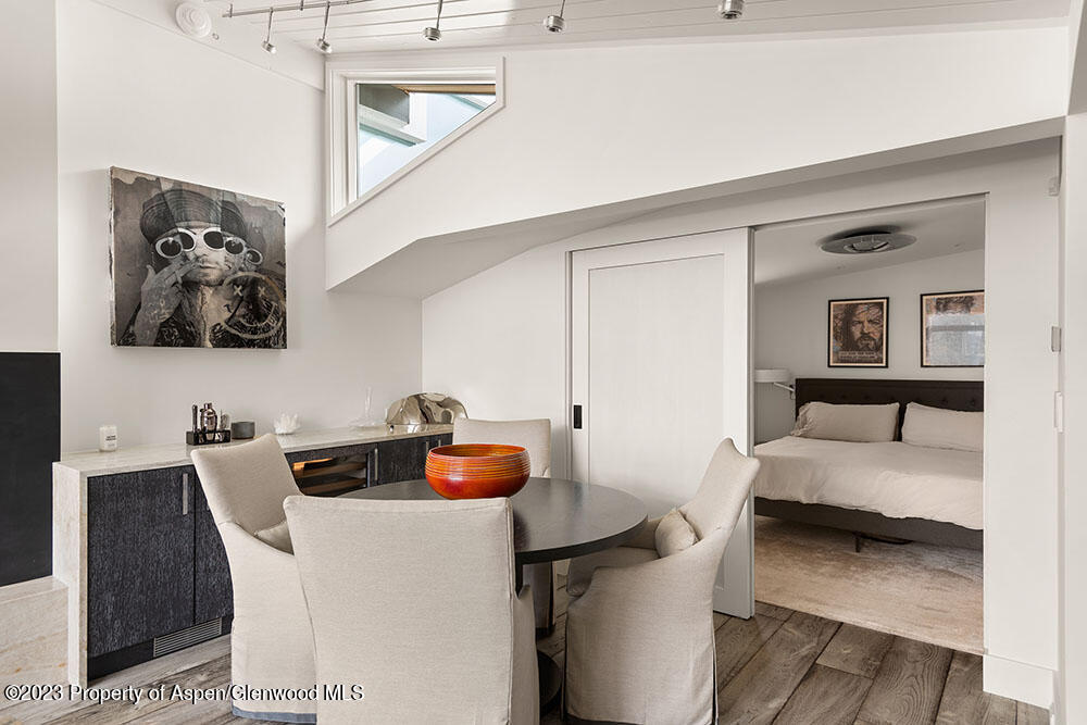 1001 East Cooper Avenue, Unit 2 Aspen, CO 81611 - Photo 5 of 17 a bedroom with a bed and a couch