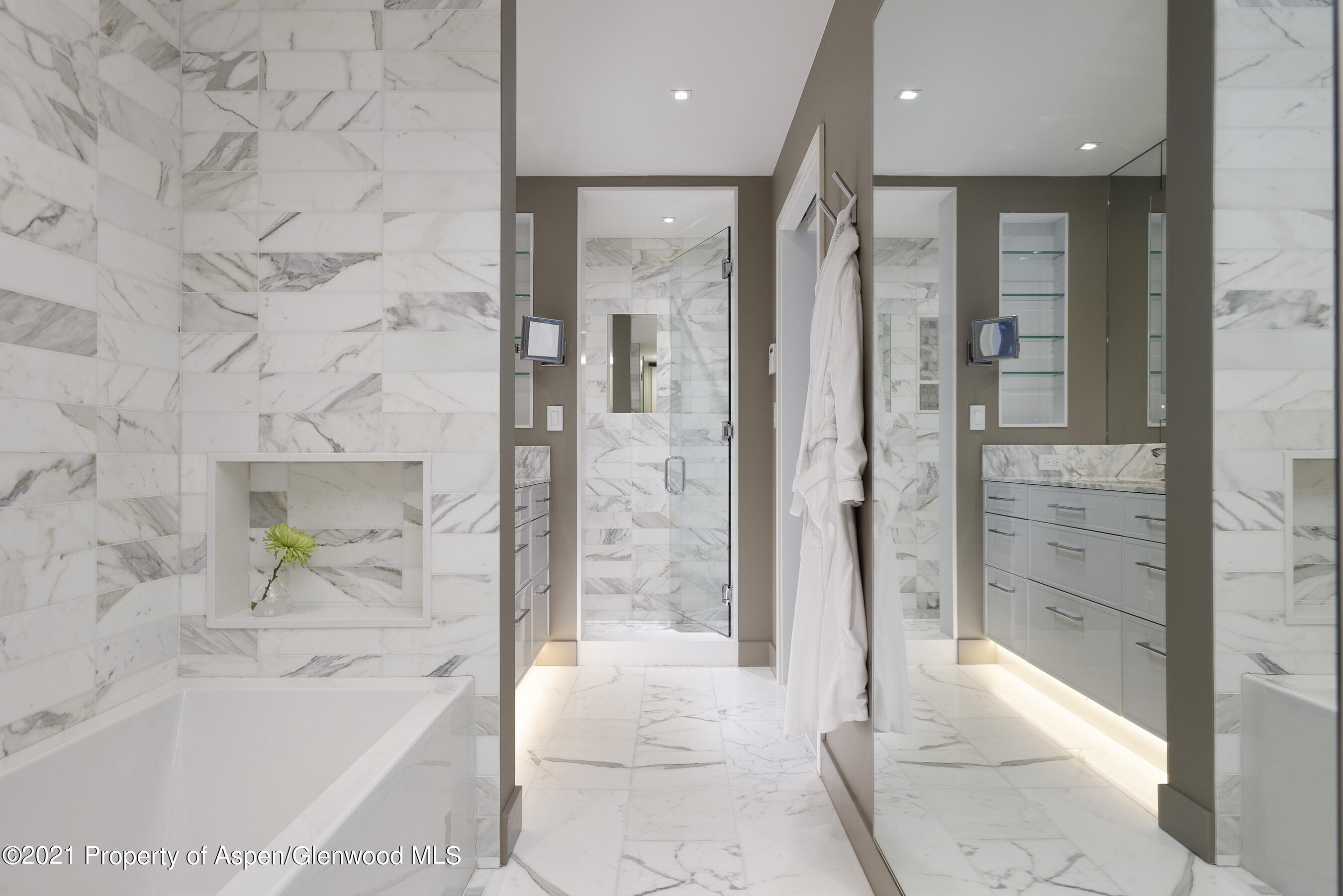 1001 East Cooper Avenue, Unit 2 Aspen, CO 81611 - Photo 9 of 17 a bathroom with a bathtub and a shower