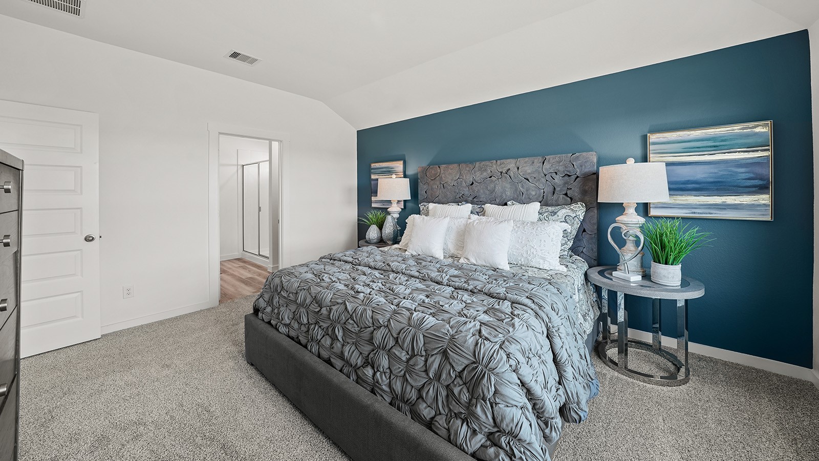 5630 Canvasback Orange, TX 77632 - Photo 15 of 31 a bedroom with a bed and a lamp on dresser