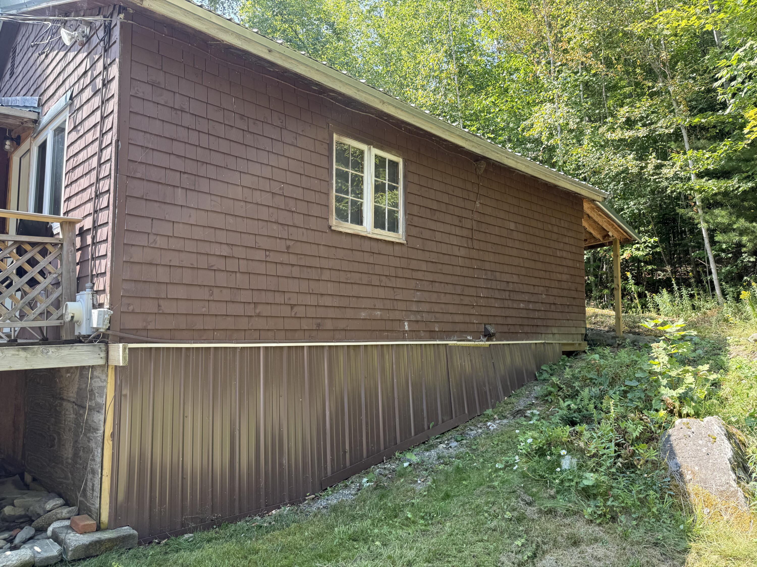 128 Bennett Pond Road Parkman, ME 04443 - Photo 4 of 37 right side view