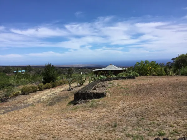 a view of a terrace with a yard