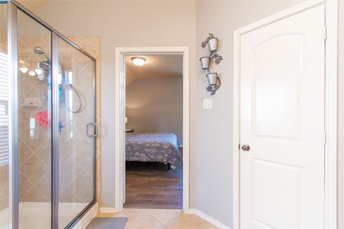 947 Madrone Drive Georgetown, TX 78628 - Photo 13 of 32 a en suite bathroom with a shower