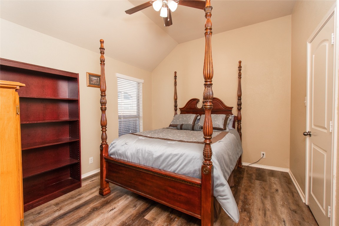 947 Madrone Drive Georgetown, TX 78628 - Photo 22 of 32 a bedroom with a bed window and cabinet