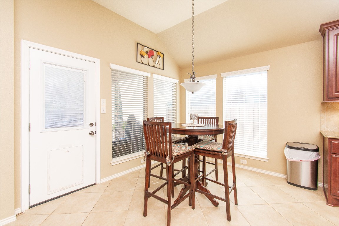 947 Madrone Drive Georgetown, TX 78628 - Photo 9 of 32 a dining room with furniture and window