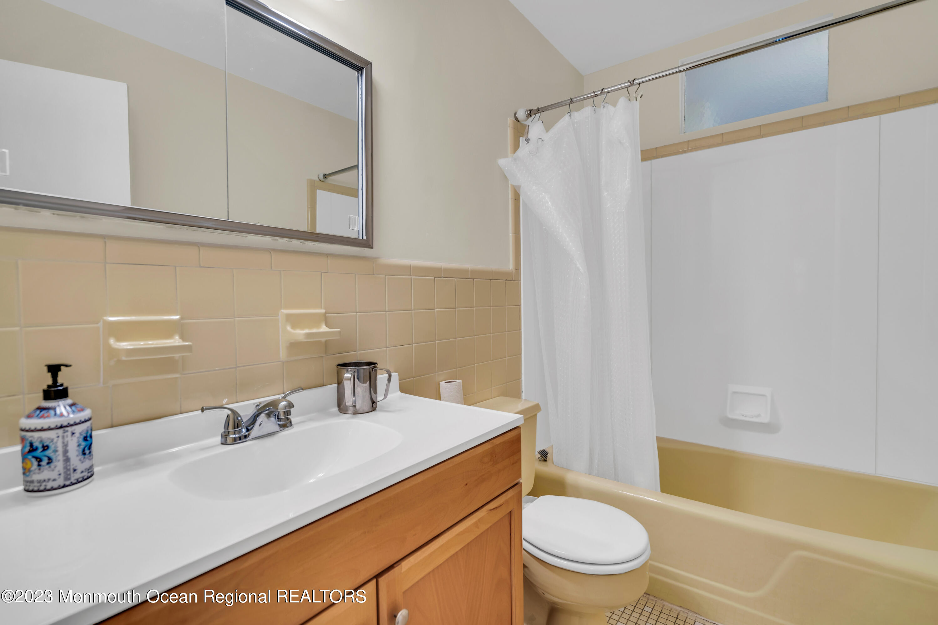 3 Alvord Street Oakhurst, NJ 07755 - Photo 12 of 20 a bathroom with a sink a toilet and shower