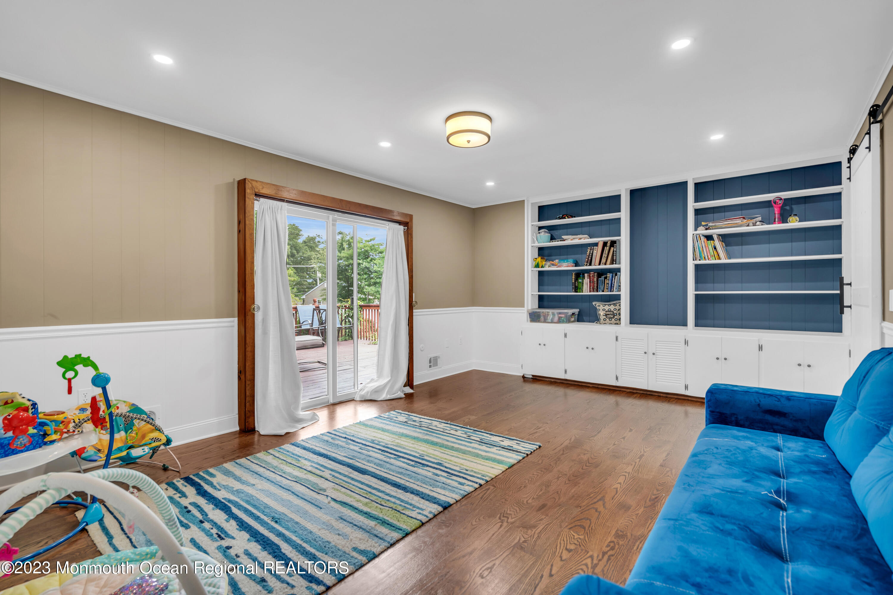 3 Alvord Street Oakhurst, NJ 07755 - Photo 16 of 20 a view of a livingroom with furniture and toys