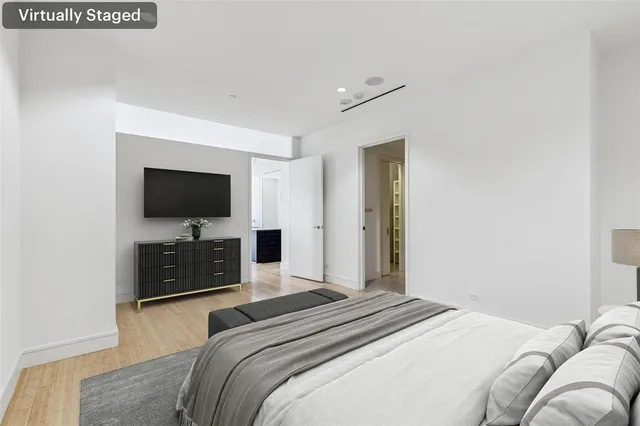 a bathroom with a sink double vanity and a mirror