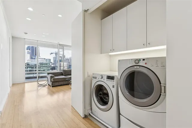 a balcony with couch and wooden floor