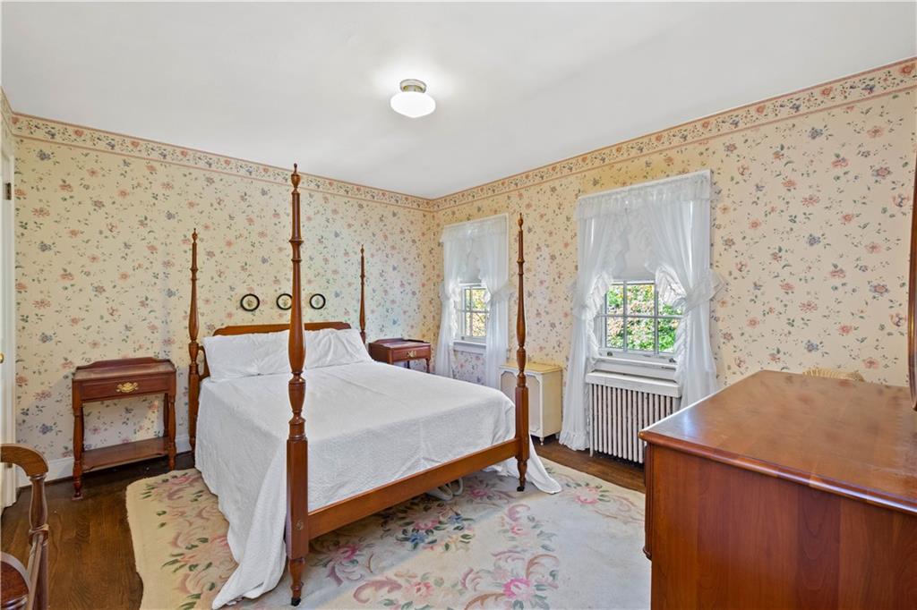 633 Olympia Road Pittsburgh, PA 15211 - Photo 15 of 25 a bedroom with a bed and a window