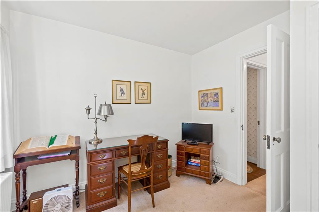 633 Olympia Road Pittsburgh, PA 15211 - Photo 21 of 25 a living room with furniture and a flat screen tv