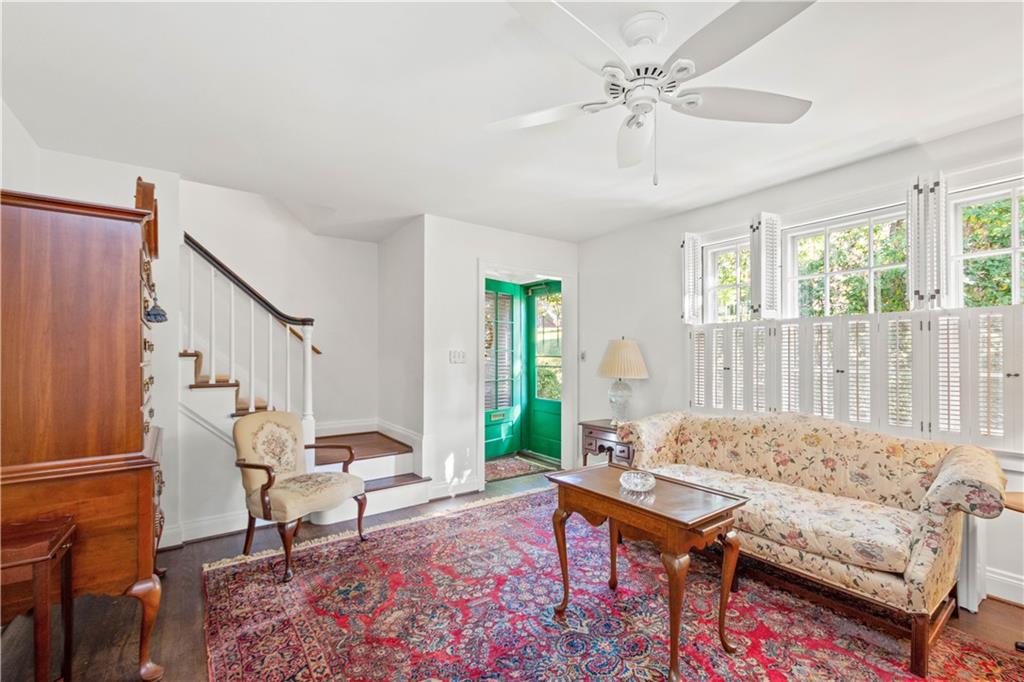 633 Olympia Road Pittsburgh, PA 15211 - Photo 7 of 25 a living room with furniture and a large window