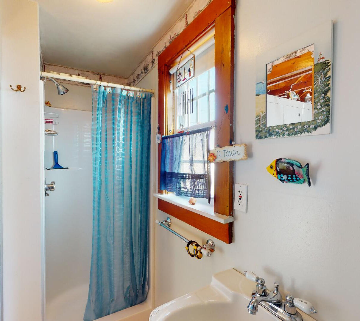 334 Shore Road, Unit 11 Truro, MA 02666 - Photo 16 of 26 a bathroom with a bathtub and a shower