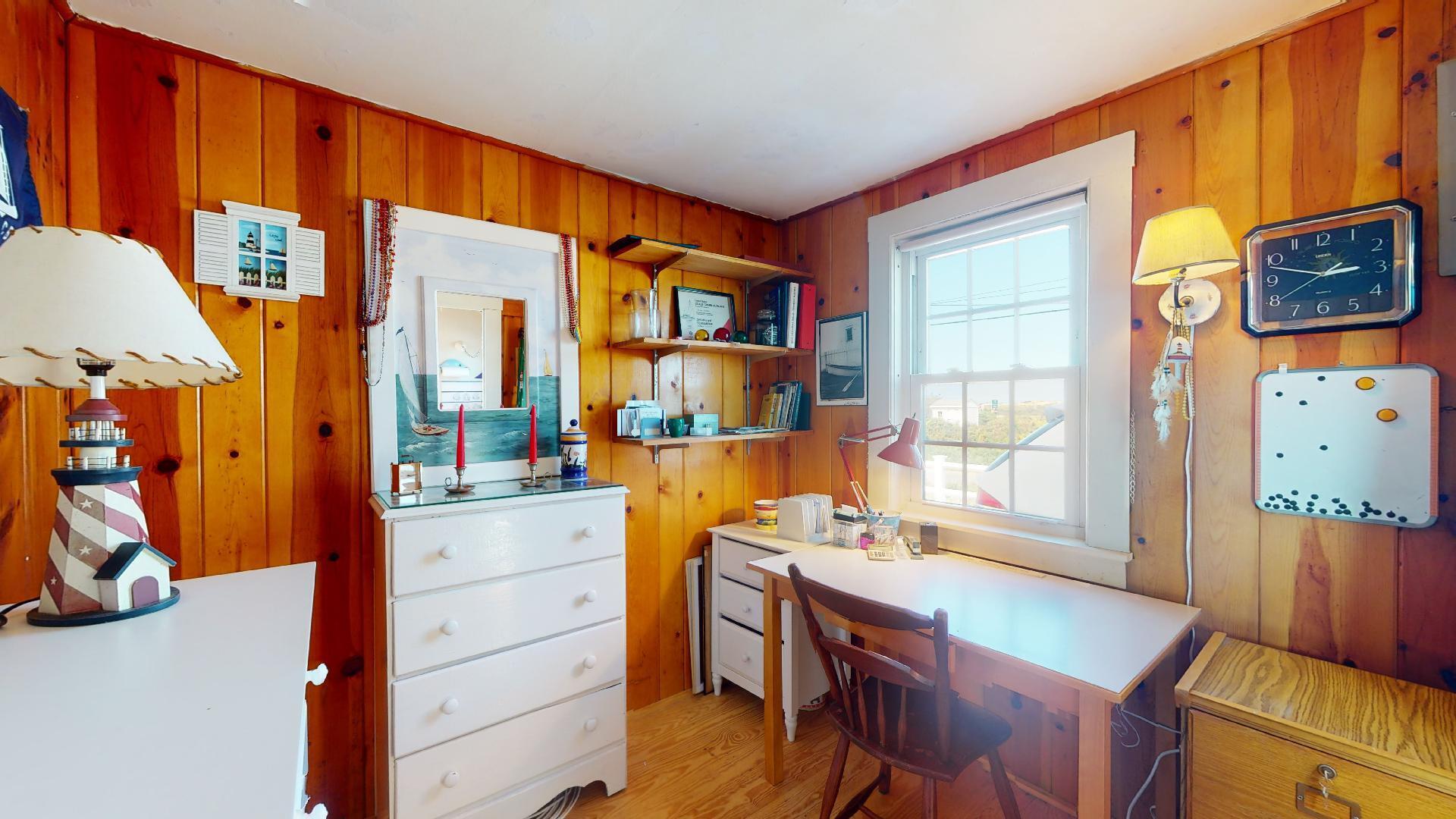 334 Shore Road, Unit 11 Truro, MA 02666 - Photo 18 of 26 a kitchen that has a sink and a stove in it