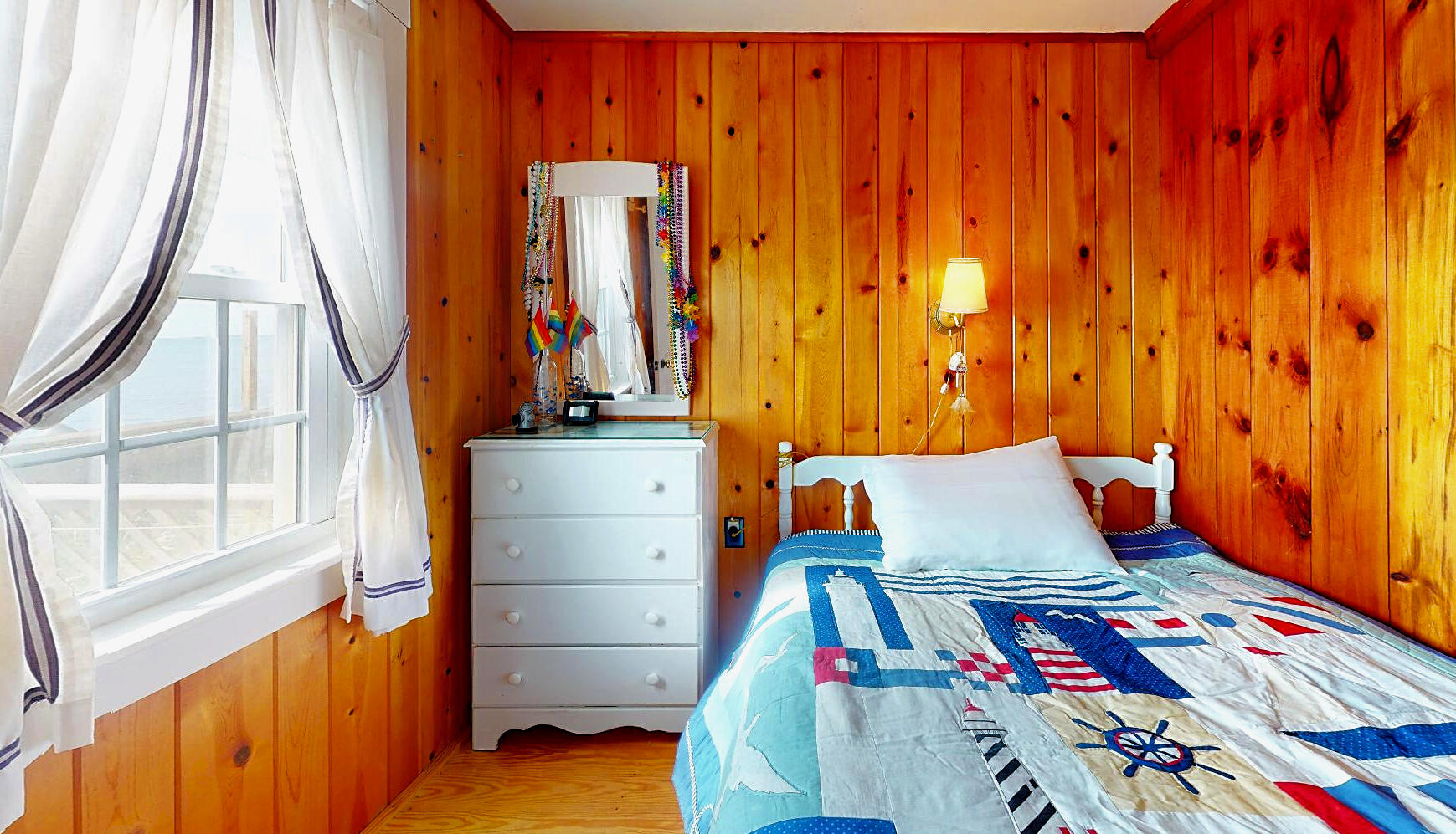 334 Shore Road, Unit 11 Truro, MA 02666 - Photo 19 of 26 a room with toys and a wooden floor