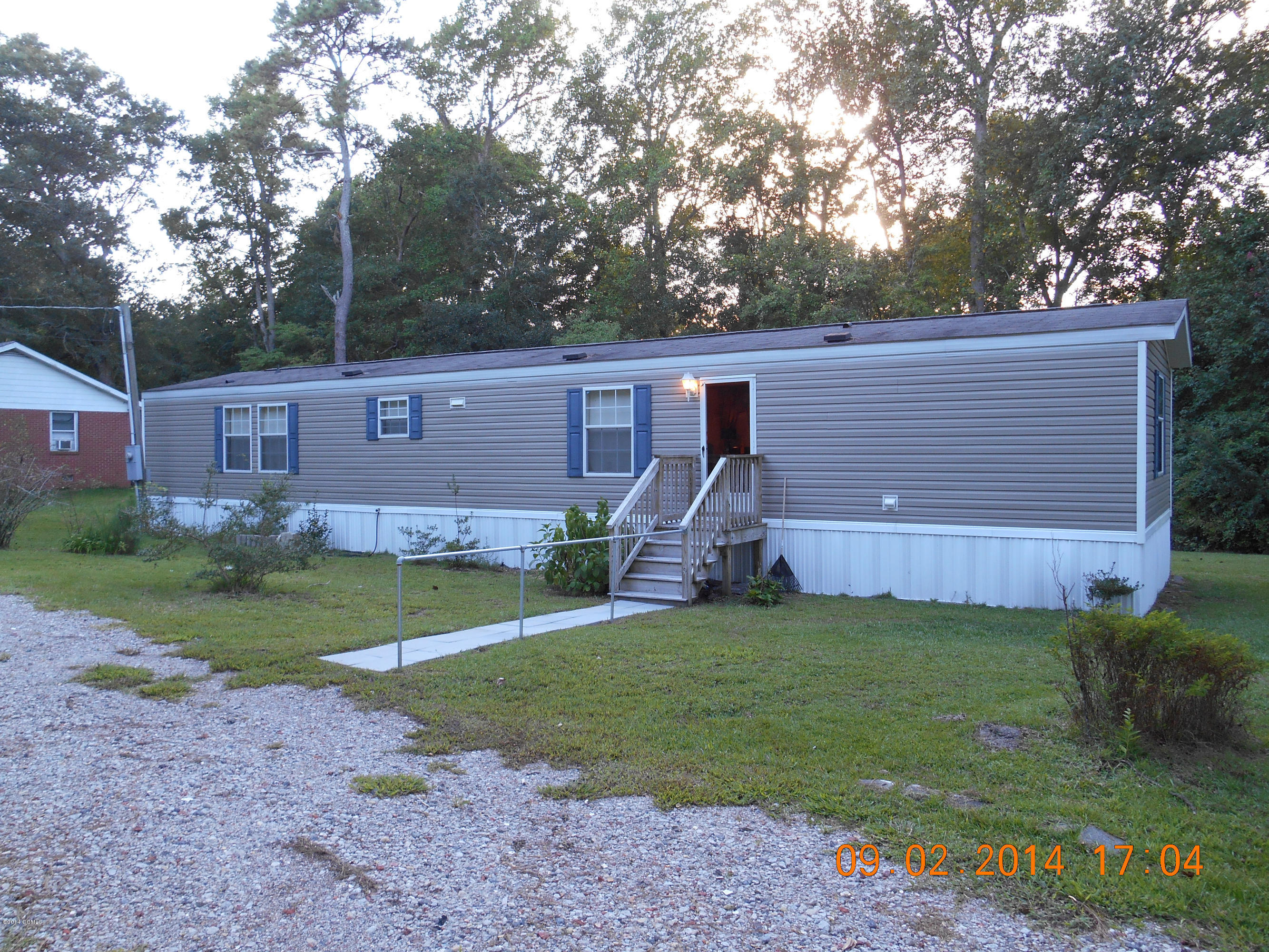 140 McCabe Road Newport, NC 28570 - Photo 20 of 21 Front Sidewalk with Hand Rail