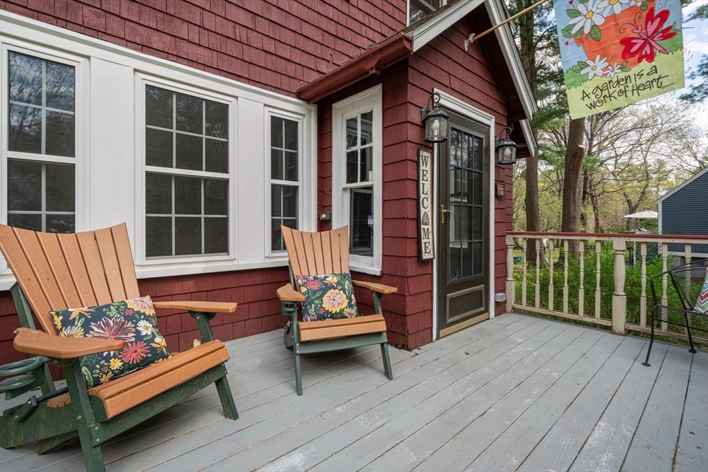 44 Shawsheen Road Billerica, MA 01821 - Photo 2 of 39 a balcony with furniture and wooden floor