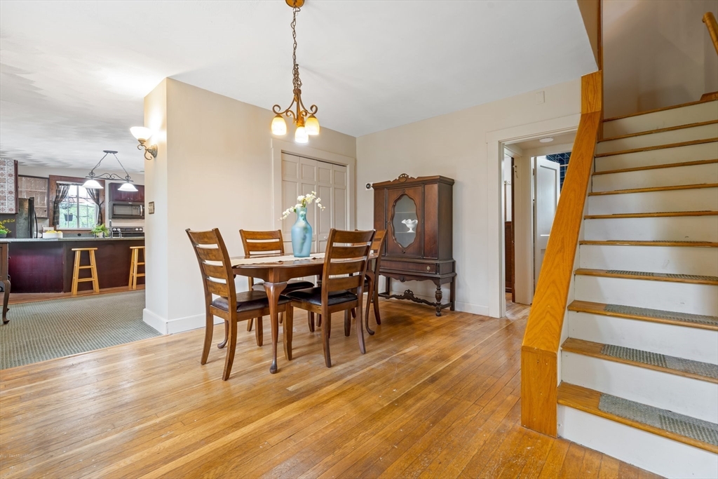 44 Shawsheen Road Billerica, MA 01821 - Photo 6 of 39 a view of a dining room with furniture and wooden floor