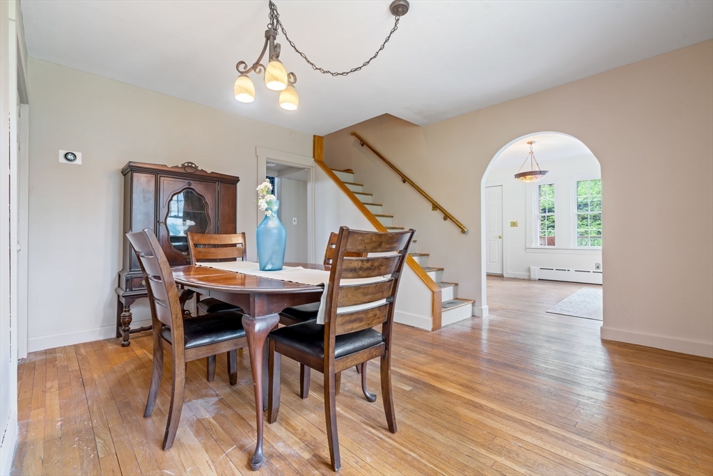 44 Shawsheen Road Billerica, MA 01821 - Photo 7 of 39 a view of a dining room with furniture wooden floor and chandelier
