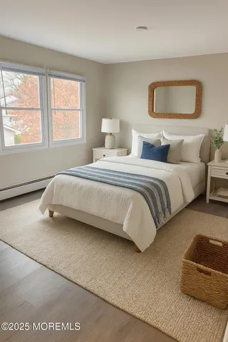 a spacious bedroom with a bed and a couch