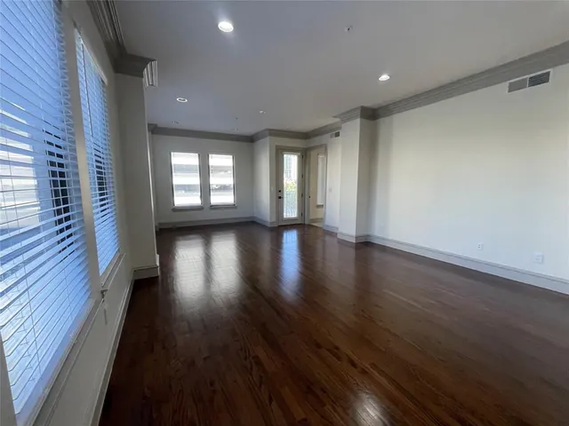 a view of a hallway with a window