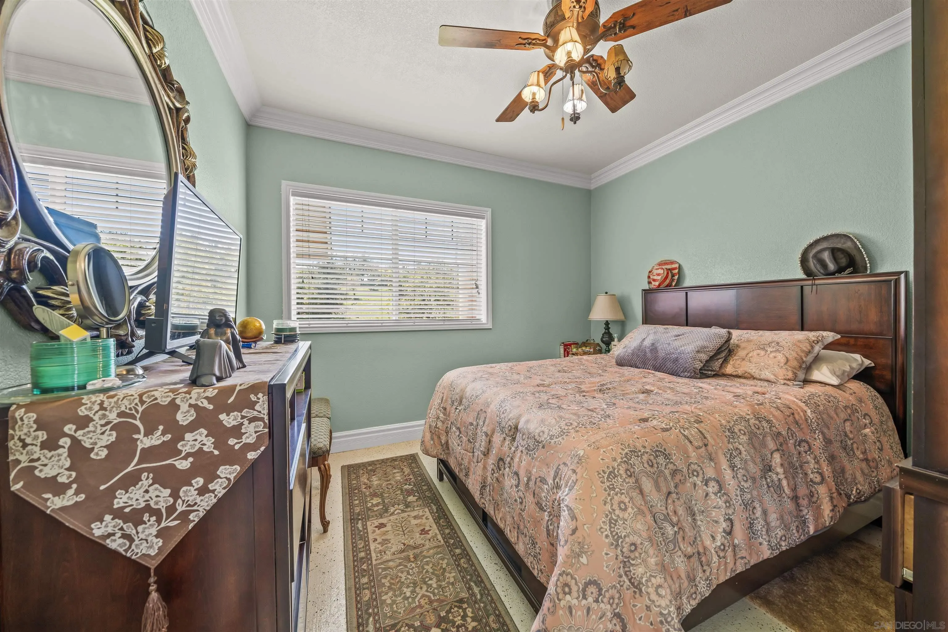 2464 Wynola Road Julian, CA 92036 - Photo 19 of 50 a bed sitting in a bedroom next to a window