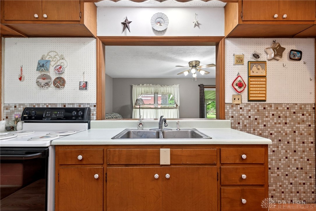 2470 Clark Run Road Xenia, OH 45385 - Photo 24 of 57 This kitchen offers a practical layout with direct views into an adjacent living area.