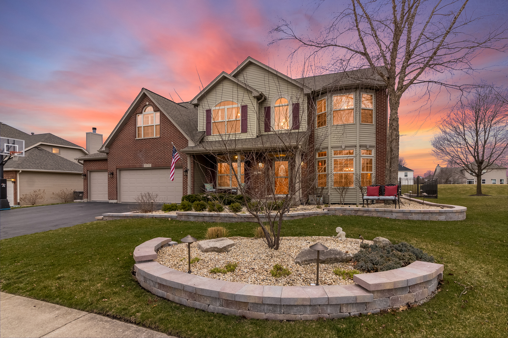 13130 Sunderlin Road Plainfield, IL 60585 - Photo 1 of 33 a view of a house with a big yard and a fountain