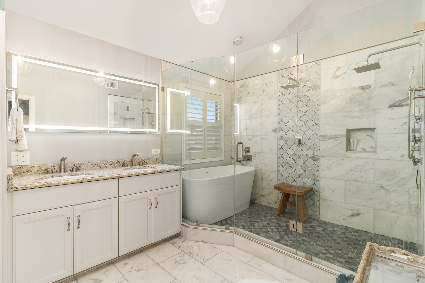 13130 Sunderlin Road Plainfield, IL 60585 - Photo 17 of 33 a bathroom with a granite countertop sink a toilet and shower
