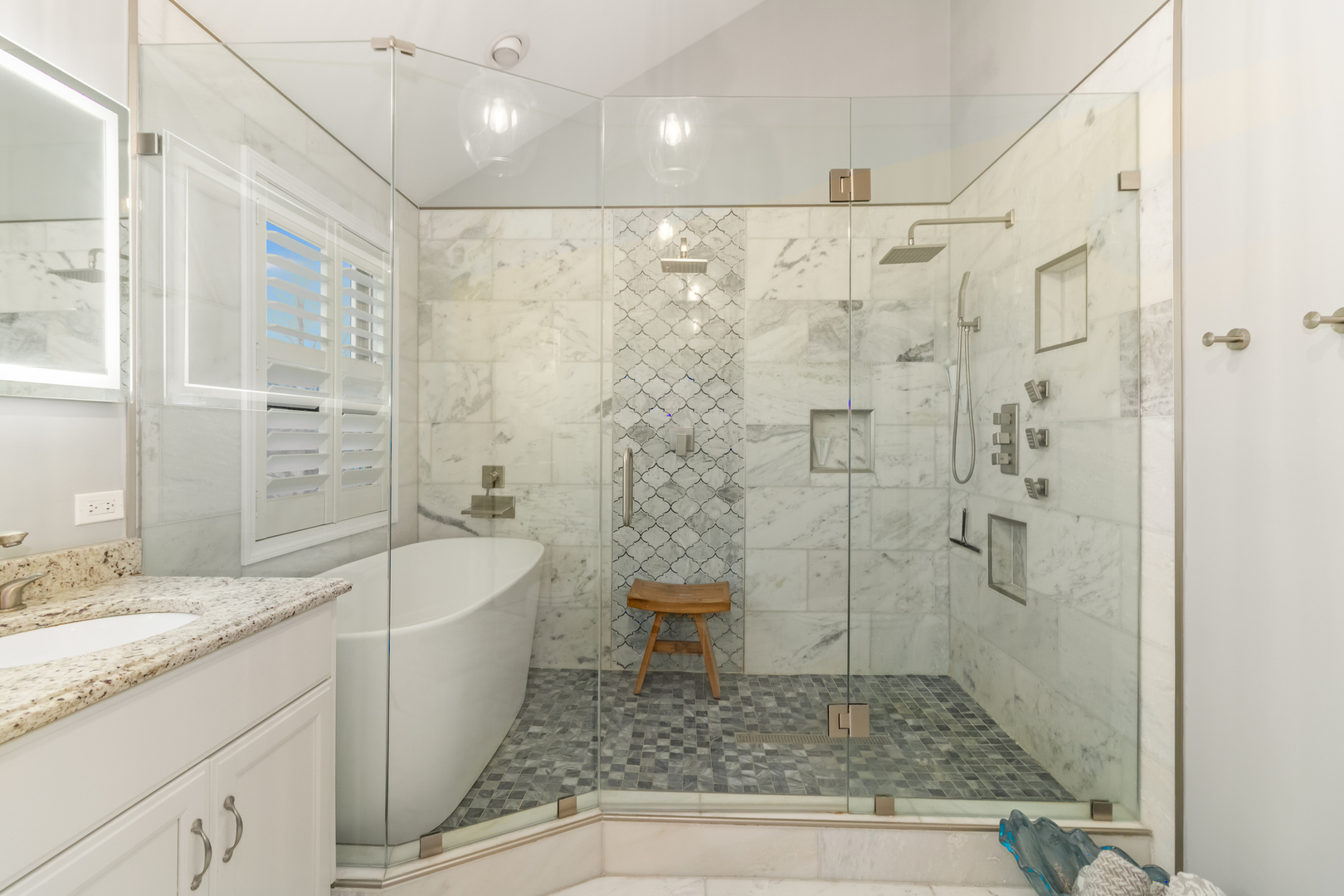 13130 Sunderlin Road Plainfield, IL 60585 - Photo 18 of 33 a bathroom with a granite countertop sink a toilet and shower