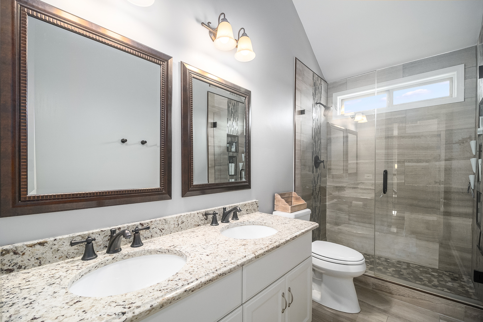 13130 Sunderlin Road Plainfield, IL 60585 - Photo 21 of 33 a bathroom with a granite countertop sink a toilet and shower