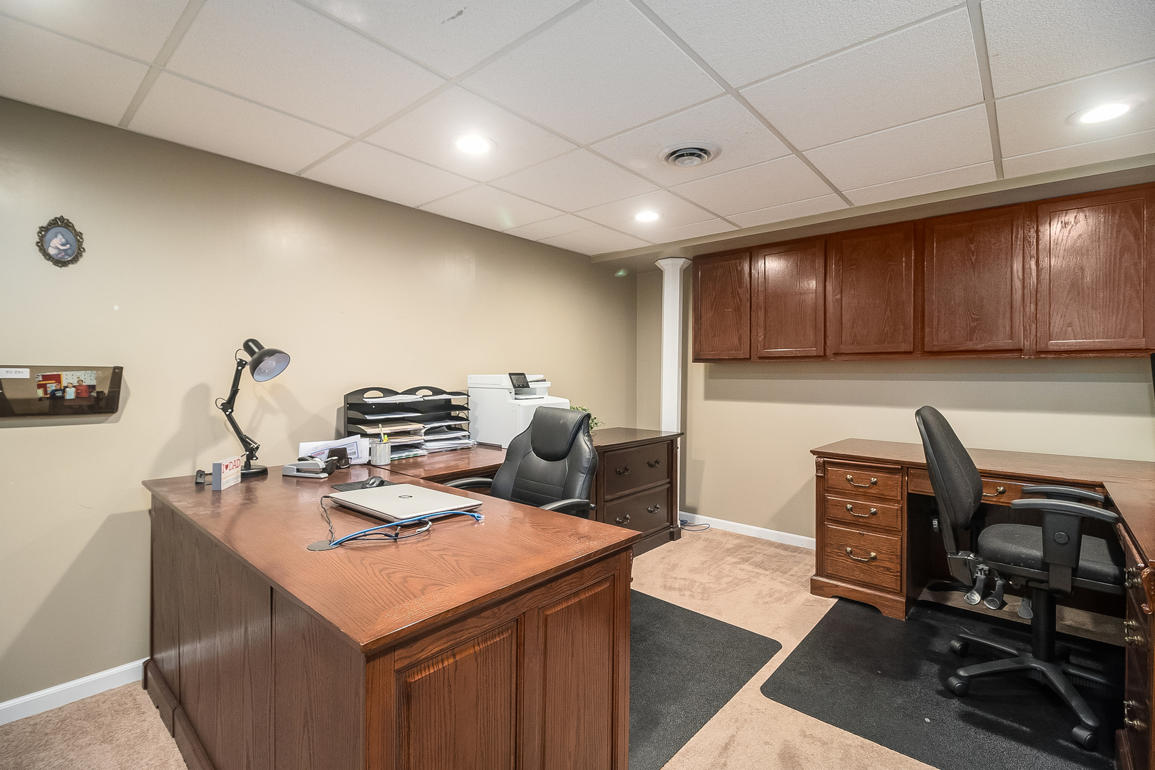 13130 Sunderlin Road Plainfield, IL 60585 - Photo 24 of 33 a kitchen with a sink a stove and chairs