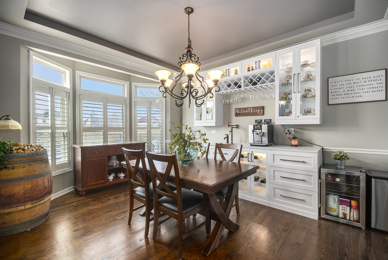 13130 Sunderlin Road Plainfield, IL 60585 - Photo 8 of 33 a view of a dining room with furniture window and wooden floor