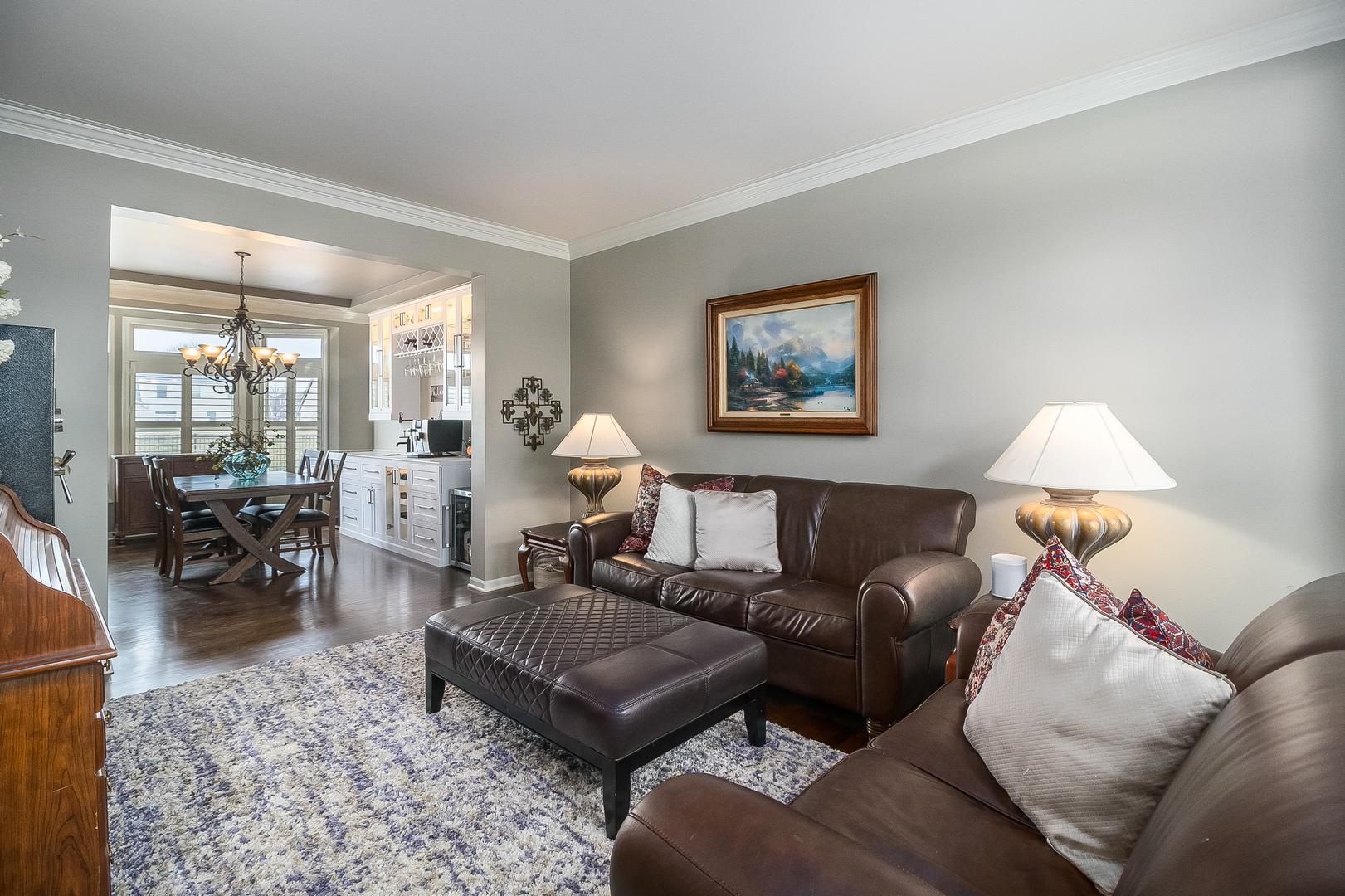 13130 Sunderlin Road Plainfield, IL 60585 - Photo 10 of 33 a living room with furniture a lamp and a window
