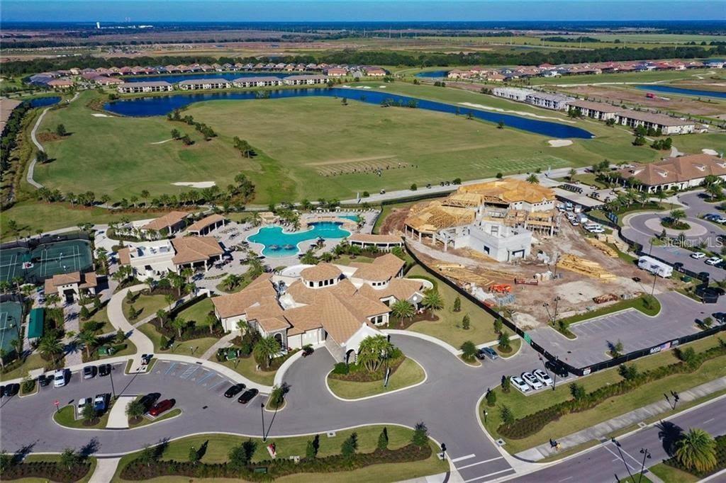 5528 Arnie Loop Lakewood Ranch, FL 34211 - Photo 41 of 59 an aerial view of residential houses with outdoor space