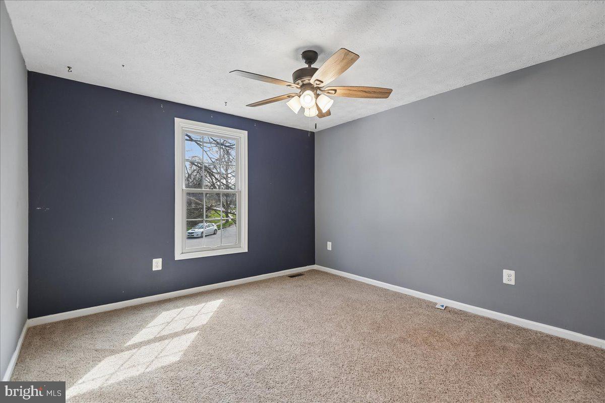 6413 White Peach Place Columbia, MD 21045 - Photo 11 of 31 a view of an empty room with a window