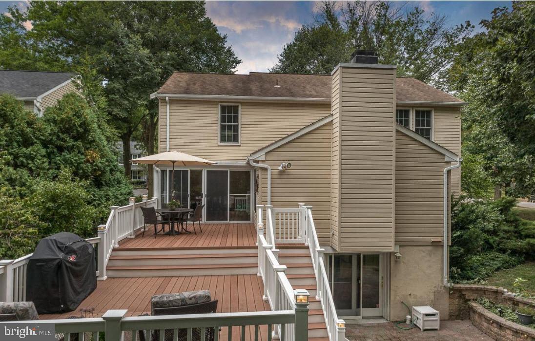 6413 White Peach Place Columbia, MD 21045 - Photo 20 of 31 a view of a house with a yard and furniture