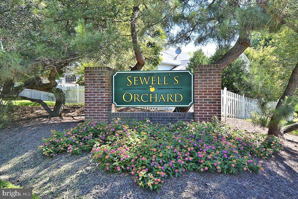 6413 White Peach Place Columbia, MD 21045 - Photo 24 of 31 a sign on the side of the road